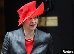 Britain's Prime Minister Theresa May leaves 10 Downing Street in London, March 12, 2018.