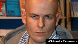 Oles Buzina published opinion pieces in Ukraine's Sevodnya daily newspaper supportive of Russia's policy toward Ukraine.