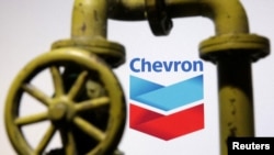 FILE - The Chevron logo is featured in this illustration photo created on Oct. 23, 2023.