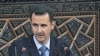 Syrian President Frees Detainees, Announces New Cabinet