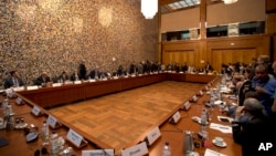 Representatives of Libya and the United Nations gather in Berlin, June 10, 2015.
