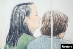FILE - Huawei CFO Meng Wanzhou, left, who was arrested on an extradition warrant, appears at her British Columbia Supreme Court bail hearing Vancouver, British Columbia, Canada, Dec. 10, 2018.