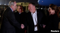 U.S. Secretary of State Mike Pompeo and his wife, Susan, are greeted by Assistant Foreign Minister For North and South American Affairs Reda Habeeb Ibrahim Zaki and Charge d'Affaires for the U.S. Embassy in Egypt, Tom Goldberger, as they arrive in Cairo, Jan. 9, 2018.