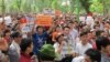 Around 500 people gather in a park in central Hanoi to protest China's deployment of an oil rig in contested waters in the South China Sea, May 11, 2014. (Marianne Brown/VOA)