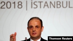 FILE PHOTO: Turkey's central bank governor Murat Cetinkaya speaks during a news conference in Istanbul, Turkey October 31, 2018. REUTERS/Murad Sezer/File Photo
