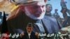  Afghan President Hamid Karzai speaks during a joint news conference with NATO Secretary General Anders Fogh Rasmussen following a security handover ceremony at a military academy outside Kabul, Afghanistan, June 18, 2013.