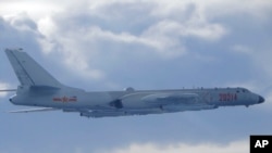 A Chinese People's Liberation Army H-6 bomber is seen flying near the Taiwan air defense identification zone, ADIZ, near Taiwan, Sept. 18, 2020, as China conducted military drills near the Taiwan Strait after threatening retaliation.