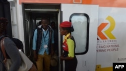 Passengers disembark upon arrival in a Mombasa-to-Nairobi train launched to operate on the Standard Gauge Railway (SGR), May 31, 2017. 