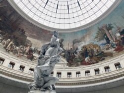 A wax replica of The Rape of the Sabine Women by 16th century artist Giambologna at the Pinault Collection. (L. Bryant/VOA)