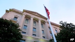 FILE - The Department of Justice headquarters in Washington. 