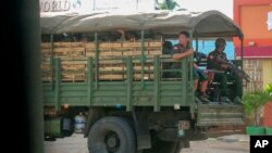 Myanmar troops and police patrol in Kayah state, eastern Myanmar, May 23, 2021. The U.N. rights office has expressed concern over recent military deployments in Chin state, Central Sagaing and Magway regions. 