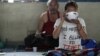 A Tibetan protester eats after the conclusion of a 24-hour hunger strike was held to express solidarity with compatriots who were victims of a Chinese crackdown in Ngaba, Sichuan Province in March, at the Tibetan Youth Club in Katmandu, Nepal, April 2011.