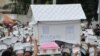 Activists March on City Hall for World Housing Rights Day