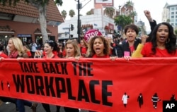 Participants march against sexual assault and harassment at the #MeToo March in the Hollywood section of Los Angeles on Nov. 12, 2017.