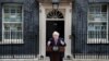 Britain's Johnson returns to work