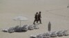 Mexican soldiers patrol the beach of San Jose del Cabo in Mexico's Baja Peninsula, Sunday, June 17, 2012. The G-20 summit starts in Los Cabos on Monday.