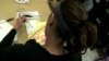 Nurse Tricia Smyth likes to work painting into her day at Georgetown University Hospital's Lombardi Cancer Center. (Adam Greenbaum/VOA)