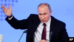 Le président russe lors d'une conférence à Moscou en Russie, le 23 décembre 2016.