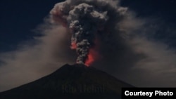 Mount Agung volcano erupts during the night, as seen from Datah village, Karangasem Regency in Bali, Indonesia on June 29, 2018. 