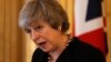 Britain's Prime Minister Theresa May speaks to the media in London, Dec. 20, 2018.