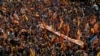 Pro-Unity Spaniards March with Facetious Movement in Barcelona
