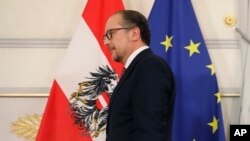 FILE _Alexander Schallenberg at news conference after being sworn in as Austrian Chancellor at the Federal Chancellery in Vienna, Oct. 11, 2021.