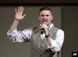 FILE - In this Dec. 6, 2016 file photo, Richard Spencer, who leads a movement that mixes racism, white nationalism and populism, speaks at the Texas A&M University campus in College Station, Texas.