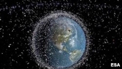 FILE - Space debris around the Earth are seen in this European Space Agency photo.