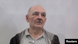 Volodymyr Tsemakh, saksi kunci kasus penembakan jatuh pesawat Malaysia Airlines nomor penerbangan MH17 tahun 2014, di pengadilan Kiev, Ukraina, 5 September 2019. (Foto: dok).