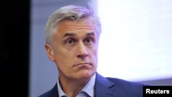 FILE - Michael Calvey, senior partner at the Baring Vostok private equity group, attends a session of the St. Petersburg International Economic Forum (SPIEF), Russia May 24, 2018.