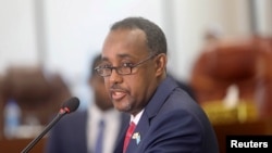 FILE - Somalia's Prime Minister Mohamed Hussein Roble speaks at the parliament in Mogadishu, Somalia, September 23, 2020. 