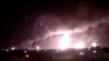 Kobaran api tambak dari kejauhan setelah drone militan Houthi dukungan Iran menyerang kilang minyak milik Saudi Aramco Saudi company Aramco's oil processing facilities, in Buqayq, Saudi Arabia September 14, 2019 in this still image taken from a social media video obtained by…