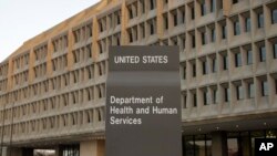 FILE - The Department of Health and Human Services building is seen in Washington, April 5, 2009. 
