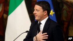 Italian Premier Matteo Renzi speaks during a press conference in Rome, Monday, Dec. 5, 2016. Renzi acknowledged defeat in a constitutional referendum and announced he would resign on Monday. Italians voted Sunday in a referendum on constitutional reforms