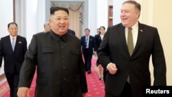 FILE - North Korean leader Kim Jong Un meets with U.S. Secretary of State Mike Pompeo in Pyongyang in this photo released by North Korea's Korean Central News Agency, Oct. 7, 2018.