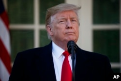 FILE - President Donald Trump in the Rose Garden of the White House, Jan. 25, 2019, in Washington.
