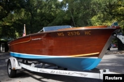 JFK's speedboat to be auctioned by Guernsey's as part of the 'John and Jackie Kennedy Pieces' in honor of what would have been JFK's 100th birthday are seen outside the Loeb Boathouse at Central Park in New York, Sept. 26, 2017.