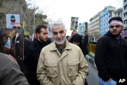 FILE - Revolutionary Guard General Qassem Soleimani attends an annual rally commemorating the anniversary of the 1979 Islamic Revolution, in Tehran, Iran, Feb. 11 2016.