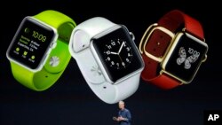 Apple CEO Tim Cook introduces the new Apple Watch, Tuesday, Sept. 9, 2014.