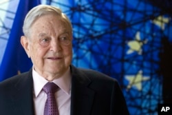 FILE - George Soros, founder and chairman of the Open Society Foundation, waits for the start of a meeting at EU headquarters in Brussels, April 27, 2017.