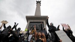 Aktivisti protestuju u Londonu, 12. juni 2020.