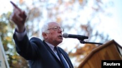 FILE - Former Democratic presidential candidate Senator Bernie Sanders (I-VT) speaks during a Capitol Hill rally to promote a people's agenda and a common commitment to stepping up grassroots mobilizations for economic and social justice and equality as the incoming Trump administration takes office in Washington, D.C., Nov. 17, 2016.