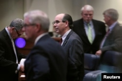 Senator Clyde Chambliss (R), center, is seen with other senators during a state Senate vote on the strictest anti-abortion bill in the United States at the Alabama Legislature in Montgomery, Alabama, May 14, 2019.