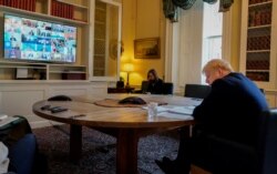 Прем'єр Великої Британії Борис Джонсон під час телеконференції з лідерами G20
