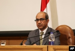 Ayman al-Muqaddam, the head of the investigation team on a Russian plane crash last week in Egypt's Sinai, speaks to news media at the Aviation Ministry in Cairo, Egypt, Nov. 7, 2015.