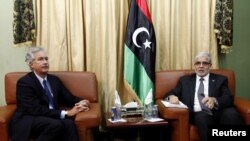Libya's Prime Minister Mustafa Abu Shagour (R) meets visiting U.S. Deputy Secretary of State William Burns in Tripoli, Libya, September 20, 2012.
