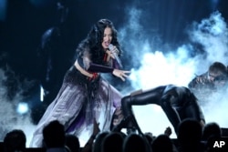 Katy Perry performs on stage at the 56th annual GRAMMY Awards at Staples Center on Jan. 26, 2014, in Los Angeles.
