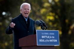 Joe Biden speaks during a campaign event at the Iowa State Fairgrounds in Des Moines, Iowa