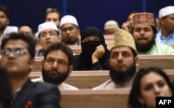 Delegates listen to Indian Prime Minister Narendra Modi's speech at the World Sufi Forum in New Delhi, March 17, 2016. The four-day event will be attended by more than 200 international delegates, spiritual leaders, scholars, academicians and masters of Sufism.