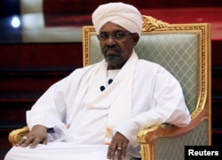 FILE - Sudanese President Omar al-Bashir addresses the National Dialogue Committee meeting at the Presidential Palace in Khartoum, April 5, 2019.